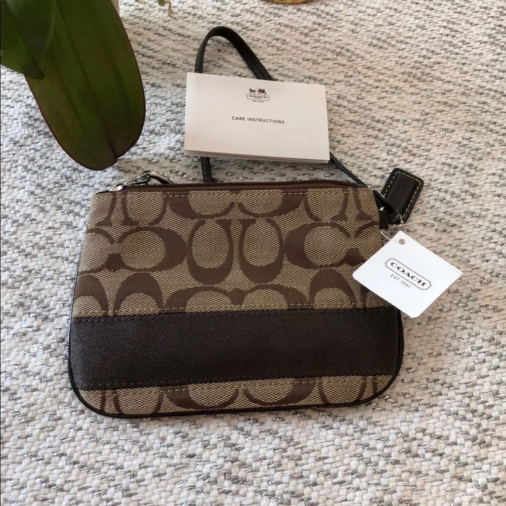 SOLD! Coach Signature C’s Wristlet Authentic